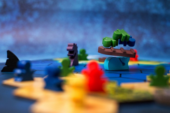 Board game pieces on a hexagonal map