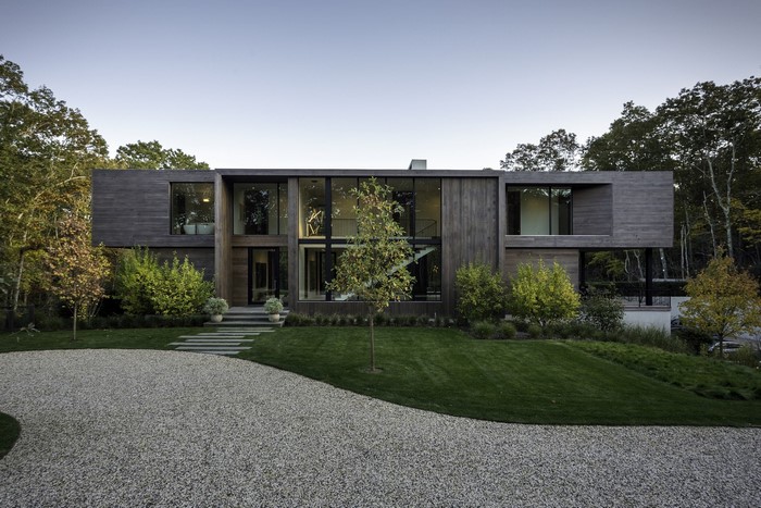 Modern luxury house with wood exterior and large windows