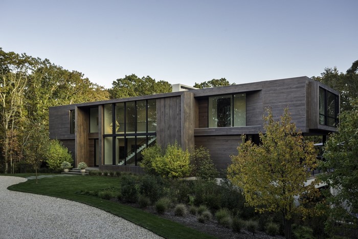 Modern luxury wood house with large windows