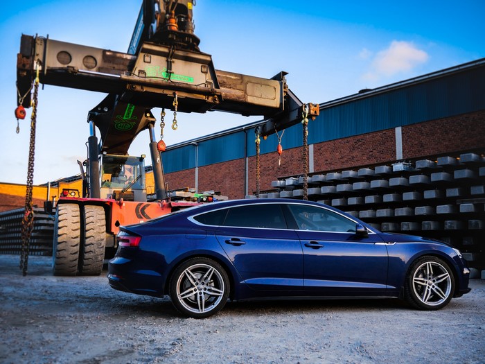 Audi A5 Coupe in Sweden with crane and concrete