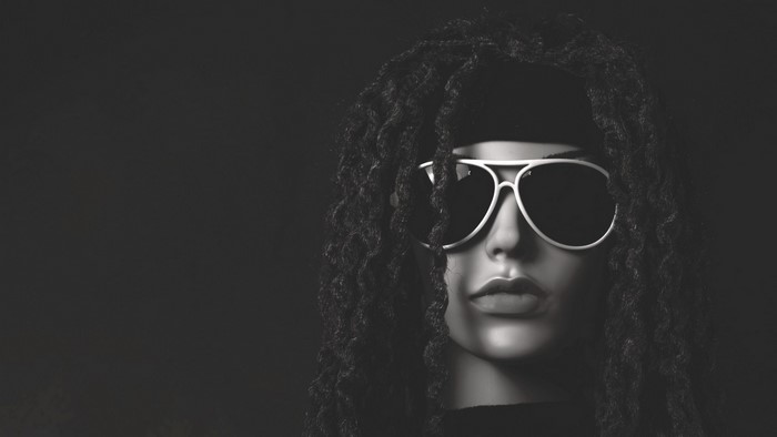 Mannequin with dreadlocks and sunglasses