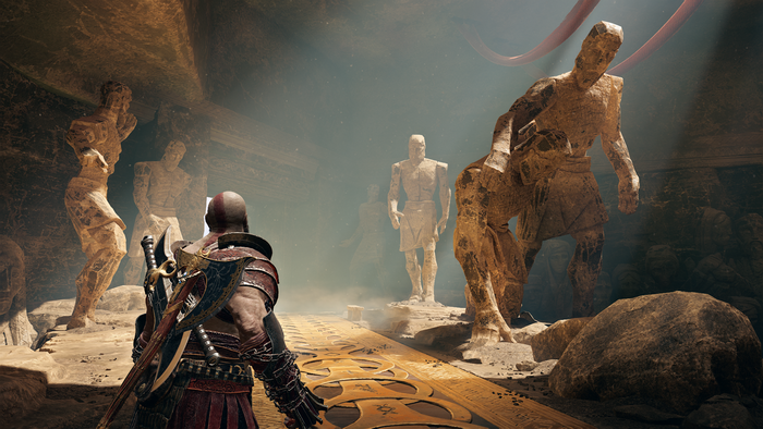 Kratos from God of War in a chamber with statues