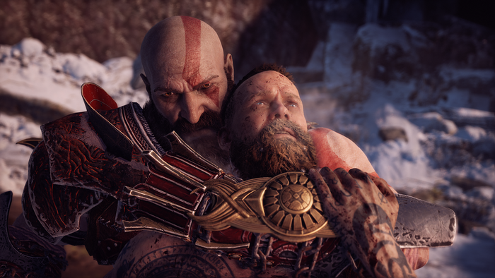 Kratos holding a man in God of War