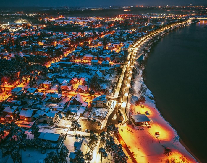 Aerial view of Kaunas, Lithuania at night in winter