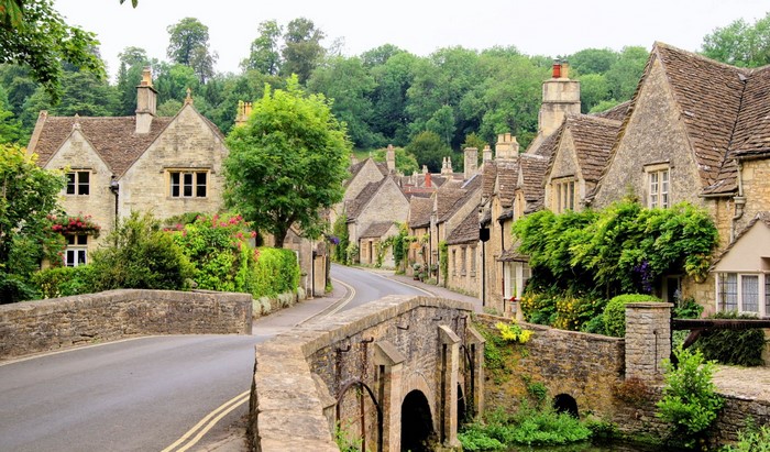 Village bridge and houses in the Cotswolds, England