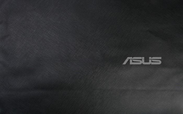ASUS logo on a textured black surface