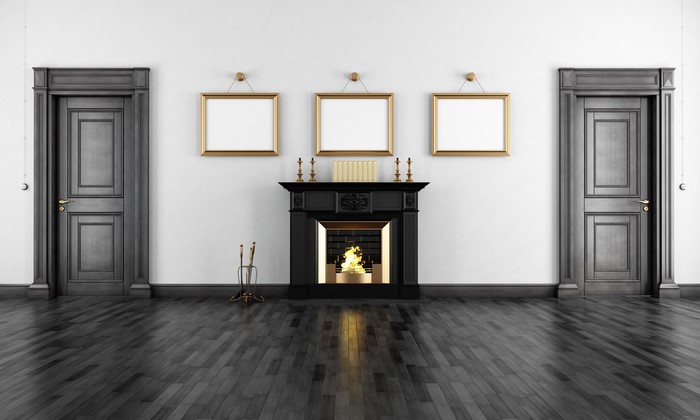 Interior room with fireplace and doors