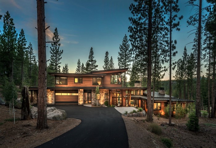 Modern Mansion Among Tall Forest Trees