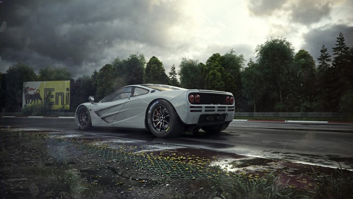Silver McLaren F1 on a wet race track