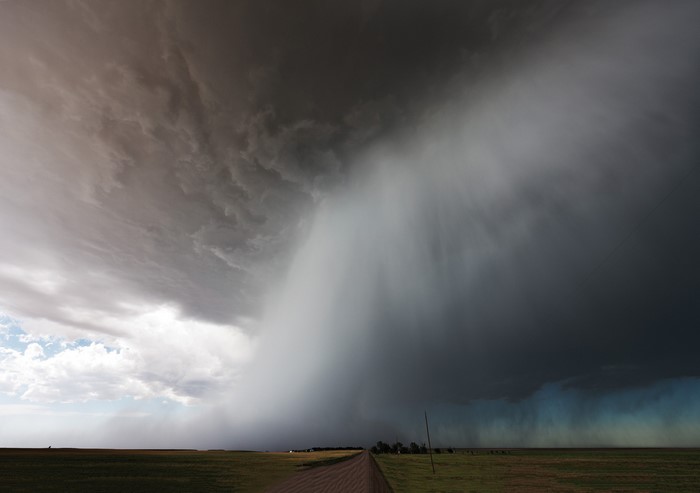 Storm clouds over a rural landscape