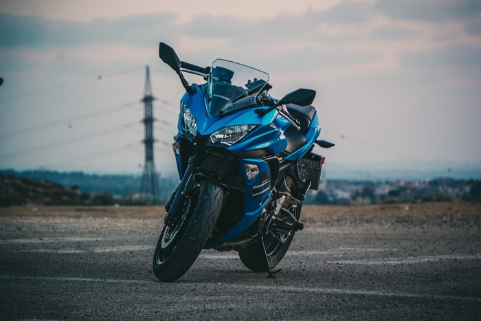 Blue Kawasaki motorcycle outdoors