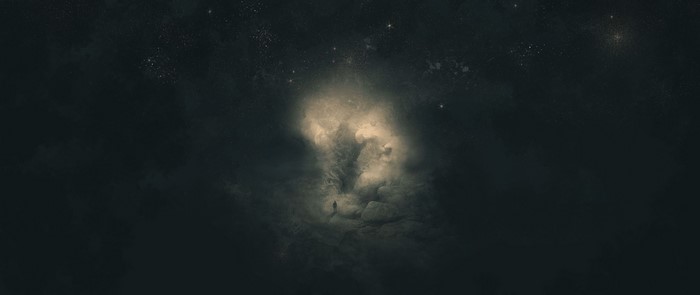A lone figure stands in a cosmic nebula with stars