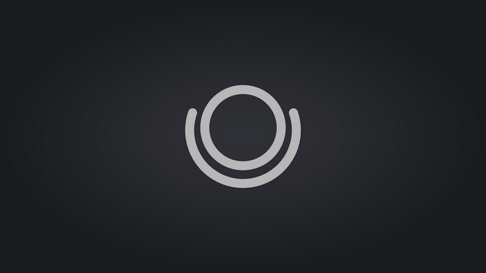 Minimalist logo with concentric circles on dark background