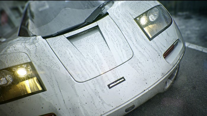McLaren F1 car in the rain