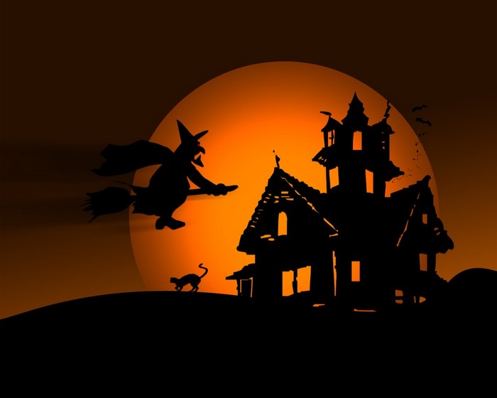 Halloween witch flying over haunted house with black cat