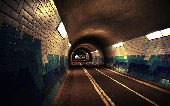 Tunnel with tiled walls and road