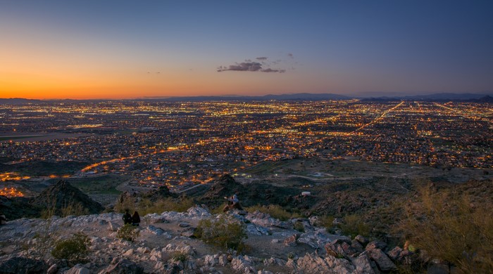 City lights at dusk from a mountain overlook