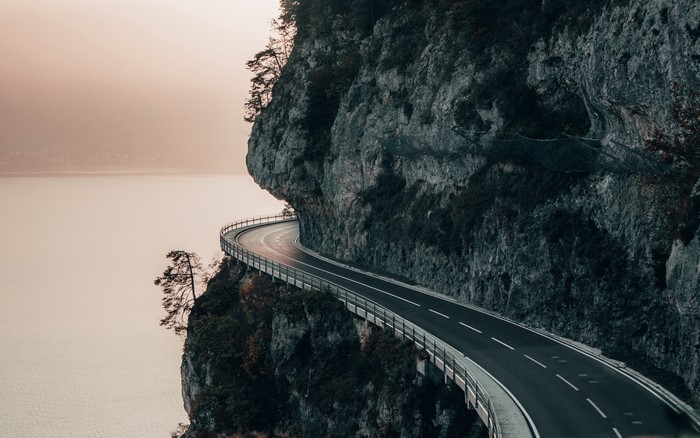 Road along a cliff overlooking the sea in Switzerland