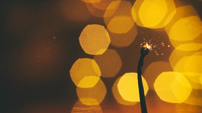 Sparkler with bokeh lights