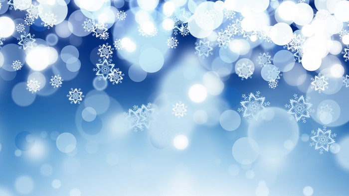 Abstract winter snowflakes and bokeh lights