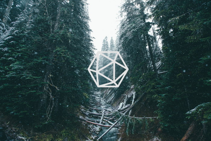 Geometric shape over snowy forest stream