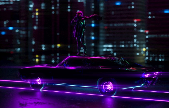 Person standing on a car with neon lights