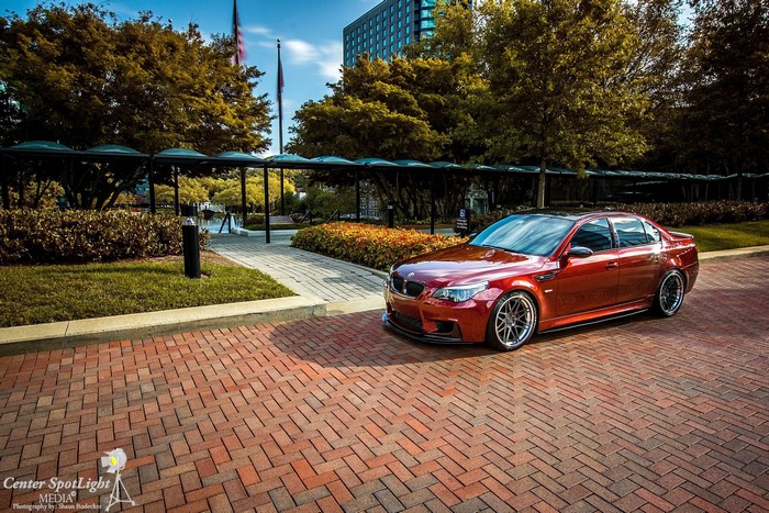 Red BMW M5 E60 Sedan on Brick Pavement