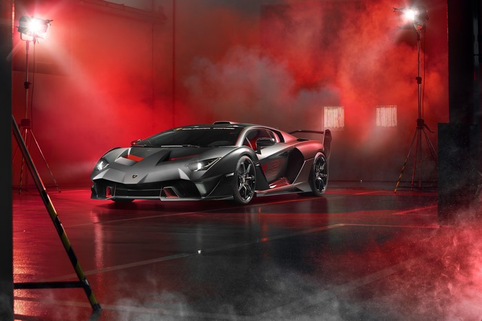 Lamborghini SC18 Alston supercar in studio with red smoke