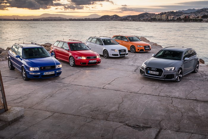 Group of Audi RS4 Avant station wagons by the sea