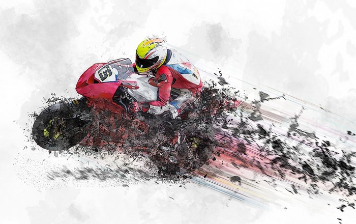 Motorcycle racer in red suit with speed design