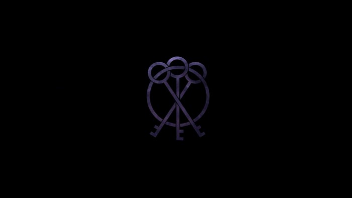 Intertwined keys logo on black background