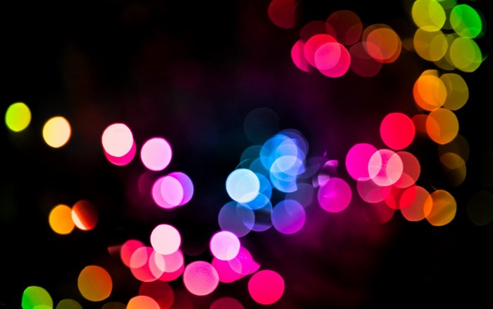 Colorful bokeh lights on a black background