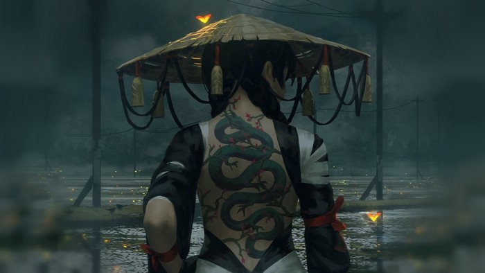 Woman with dragon tattoo wearing a conical hat