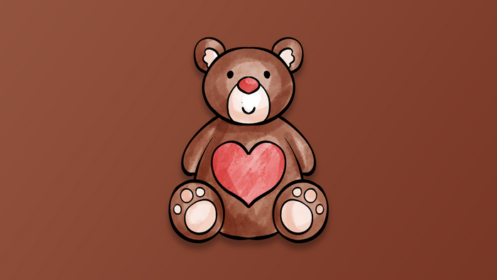 Brown teddy bear with a red heart