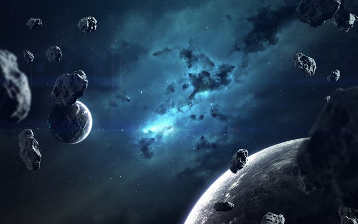 Space art with planets and asteroids