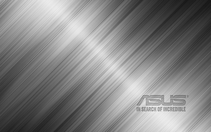 ASUS logo on brushed metal background