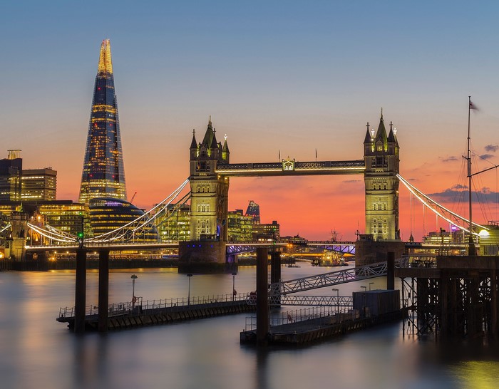 4K London cityscape with Tower Bridge and The Shard at sunset