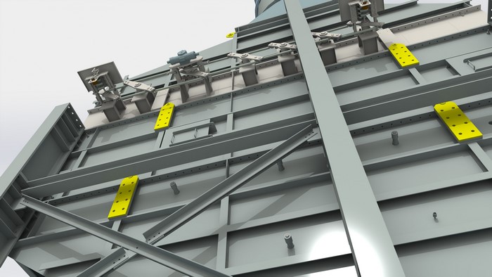 Industrial structure with yellow plates and machinery