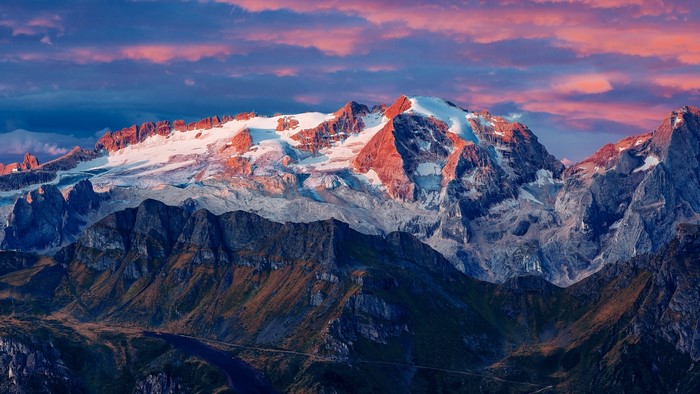 Snow-capped mountains in Italy at sunset