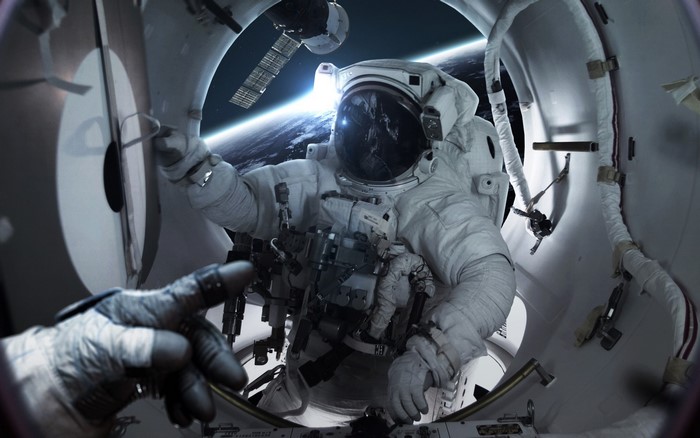 Astronaut in space by Vadim Sadovski