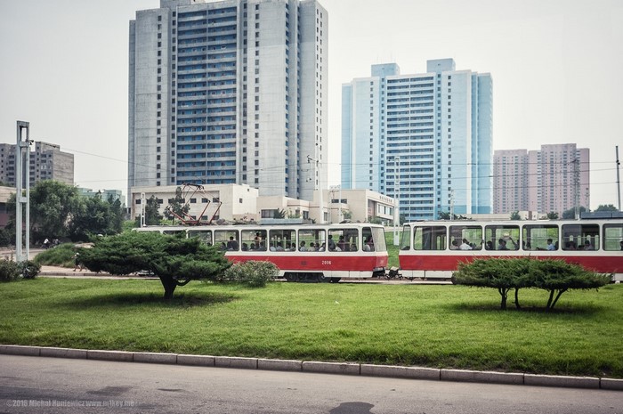 Trams in front of apartment buildings in Pyongyang, North Korea