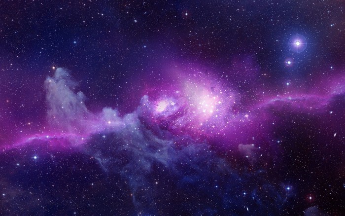 Vibrant purple and blue nebula with glowing stars