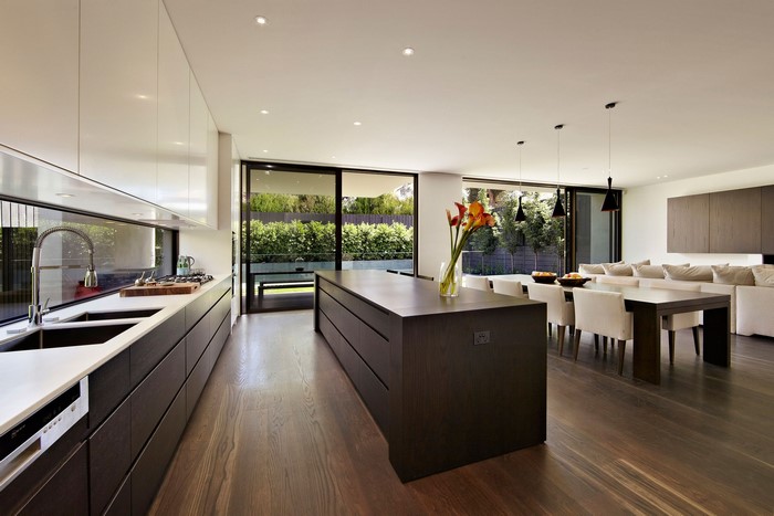 Modern luxury kitchen and dining area with outdoor view