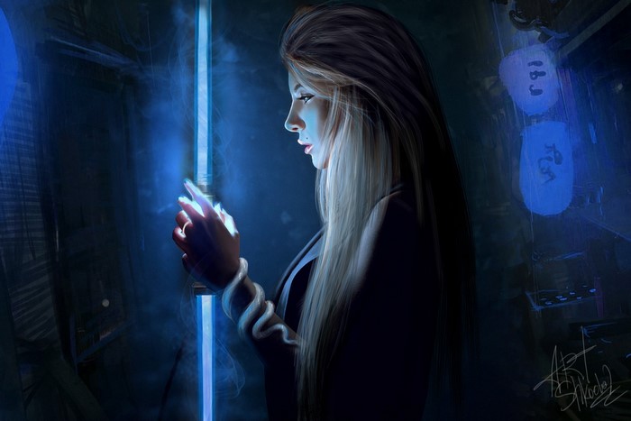 Woman touching a glowing blue light