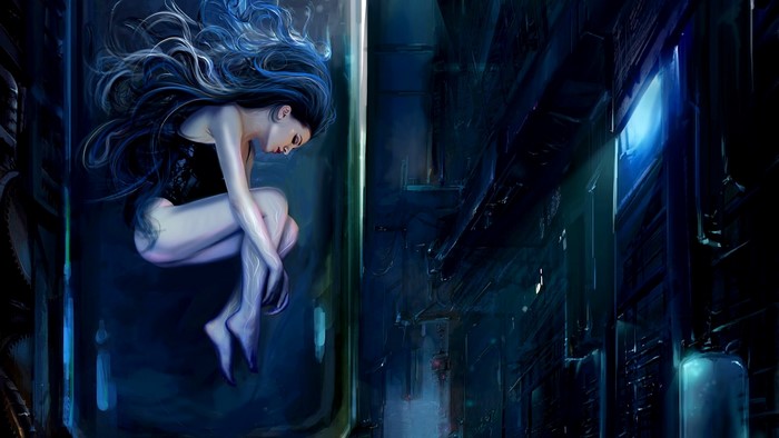 Woman in a futuristic tank with blue lighting
