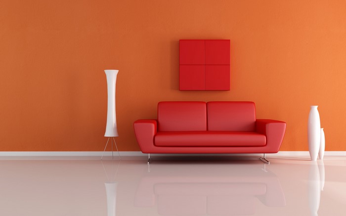 Red couch and vases in a modern living room