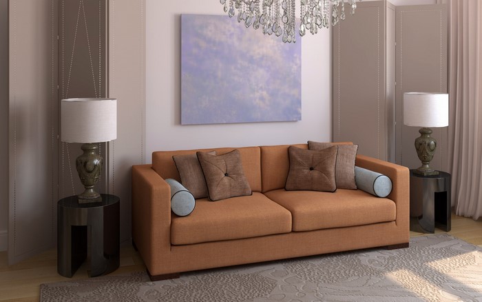 Living room with orange couch and lamps