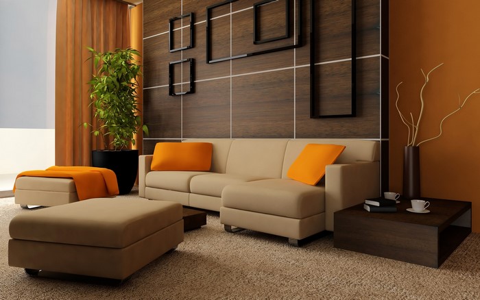 Modern living room with sectional couch and orange accents