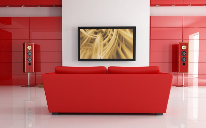 Modern red living room with TV and speakers