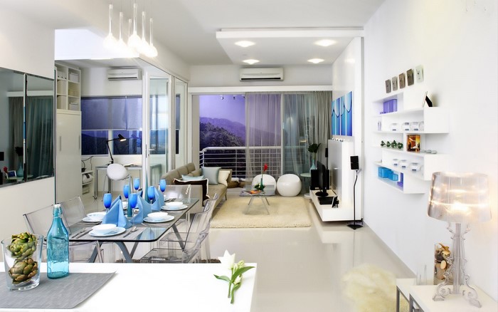 Modern living and dining room with mountain view